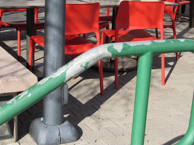 Galvanized handrail with chipped paint